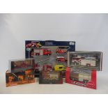 A selection of emergency services fire tenders, all boxed, to include the Burago Falck gift set.