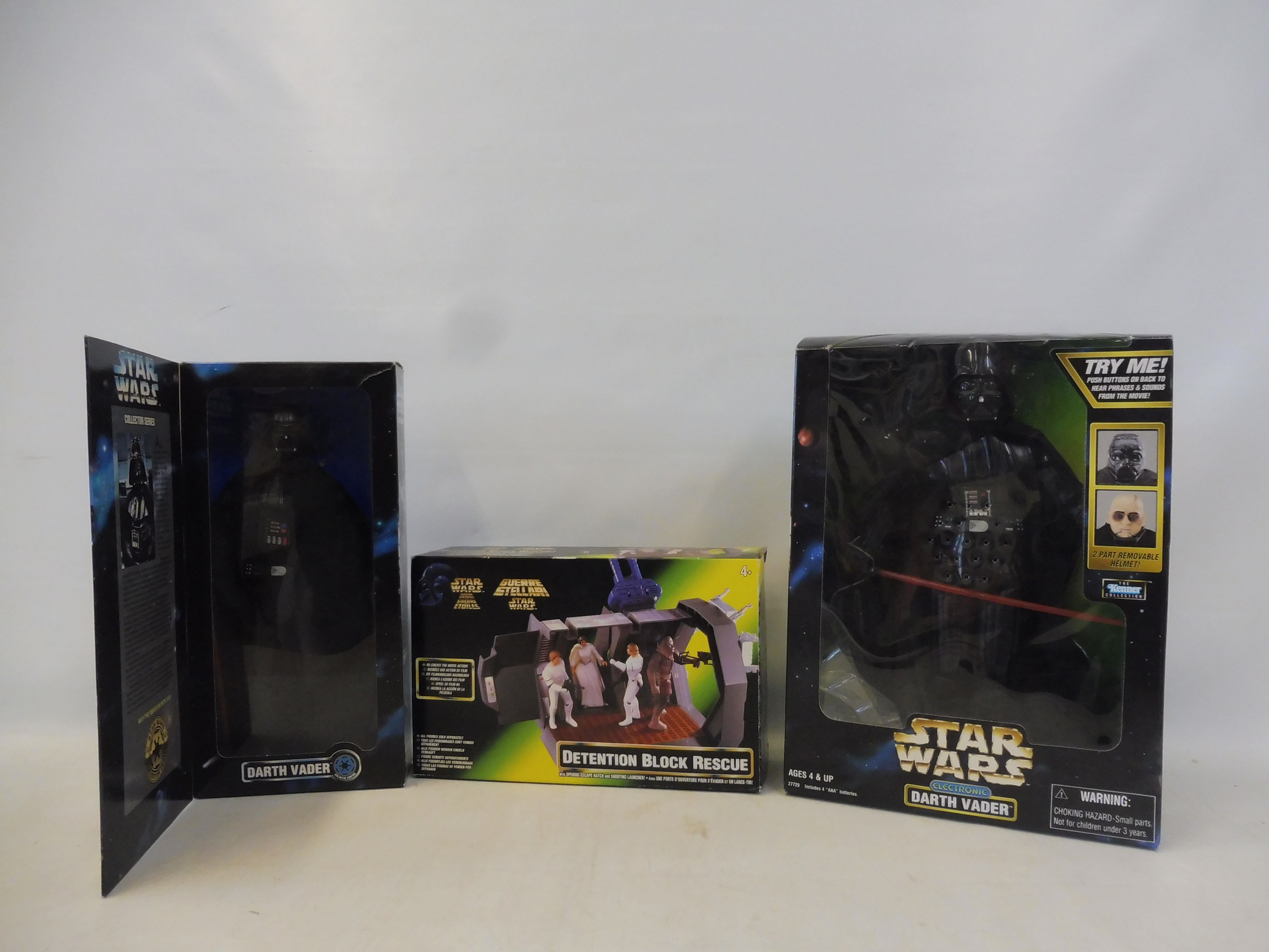 A Star Wars collectors' series, 12" Darth Vader, an electronic Darth Vader and a Power of the