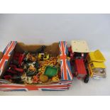 A small quantity of Britains agriculture and farming tractors, trailers and figures.