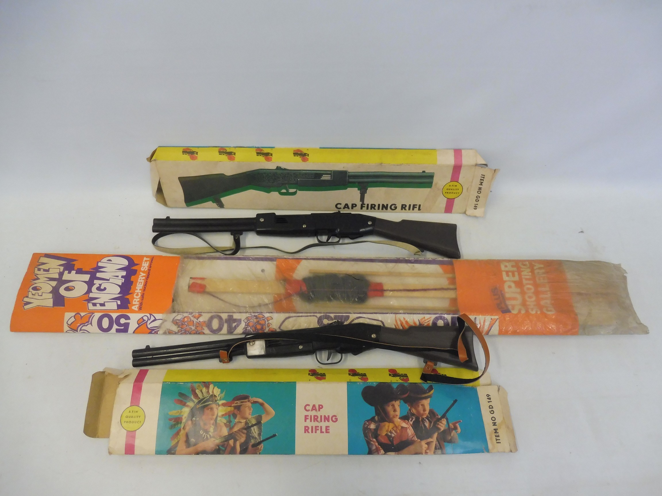 A small selection of circa 1970s boxed Wild West including a rifle, a bow and arrow etc.