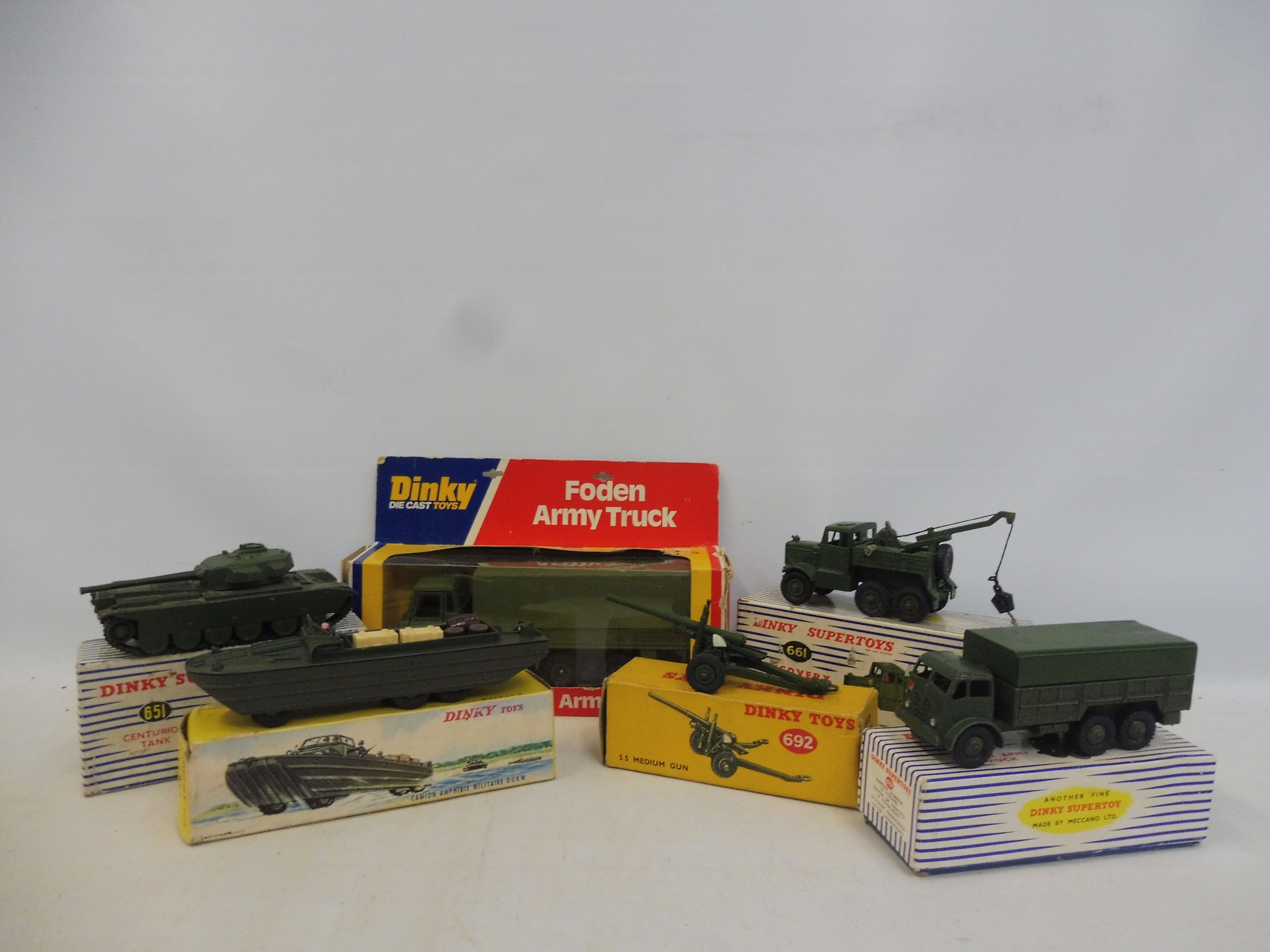 Six boxed Dinky military vehicles/gun.
