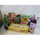A box of 1970s-1990s toys including a soccer game, Wild West wagon etc.
