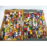 A large quantity in two trays of die-cast vehicles to include Lesney, Matchbox etc. all playworn.