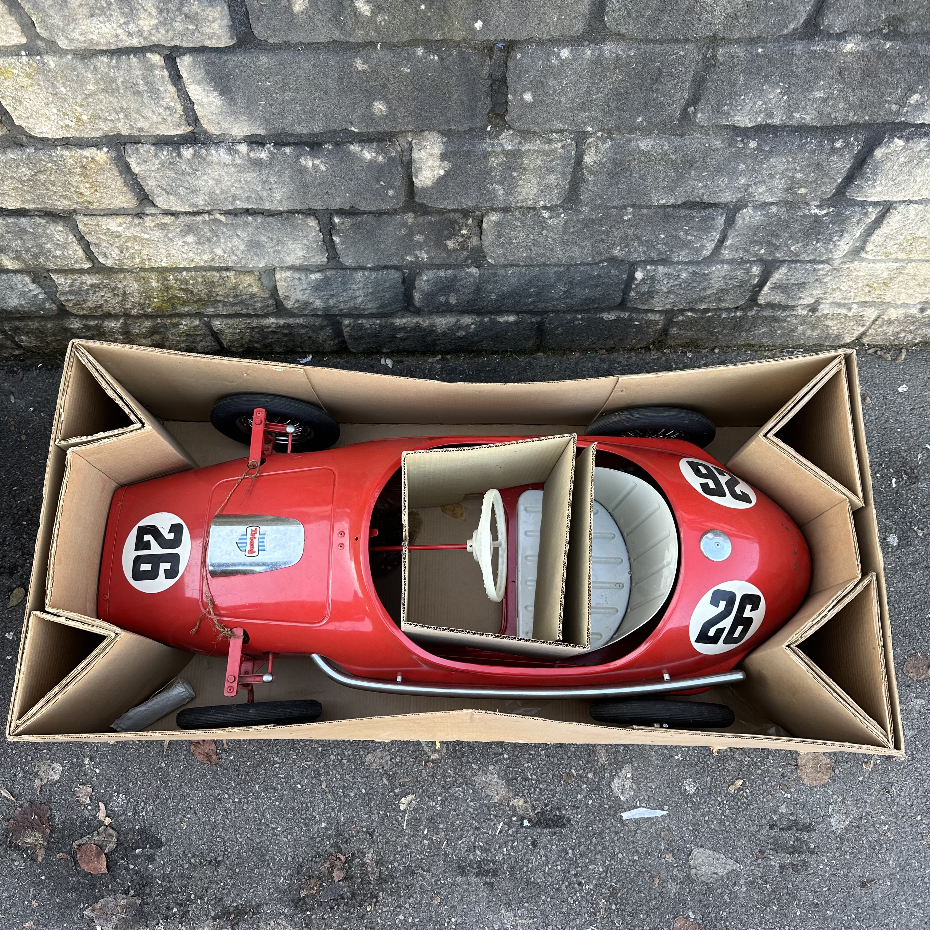 A Tri-ang Toys Grand Prix racing car in Ferrari Red, in original box with innards, approx 5ft - Image 5 of 7