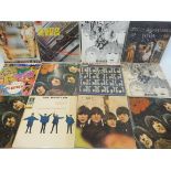 Beatles: 10 LPs and a George Harrison LP, predominantly early pressings on the yellow Parlophone