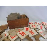 A box of auctioneer's wooden paddles.