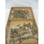 Two trays of WWII era well painted metal soldiers.