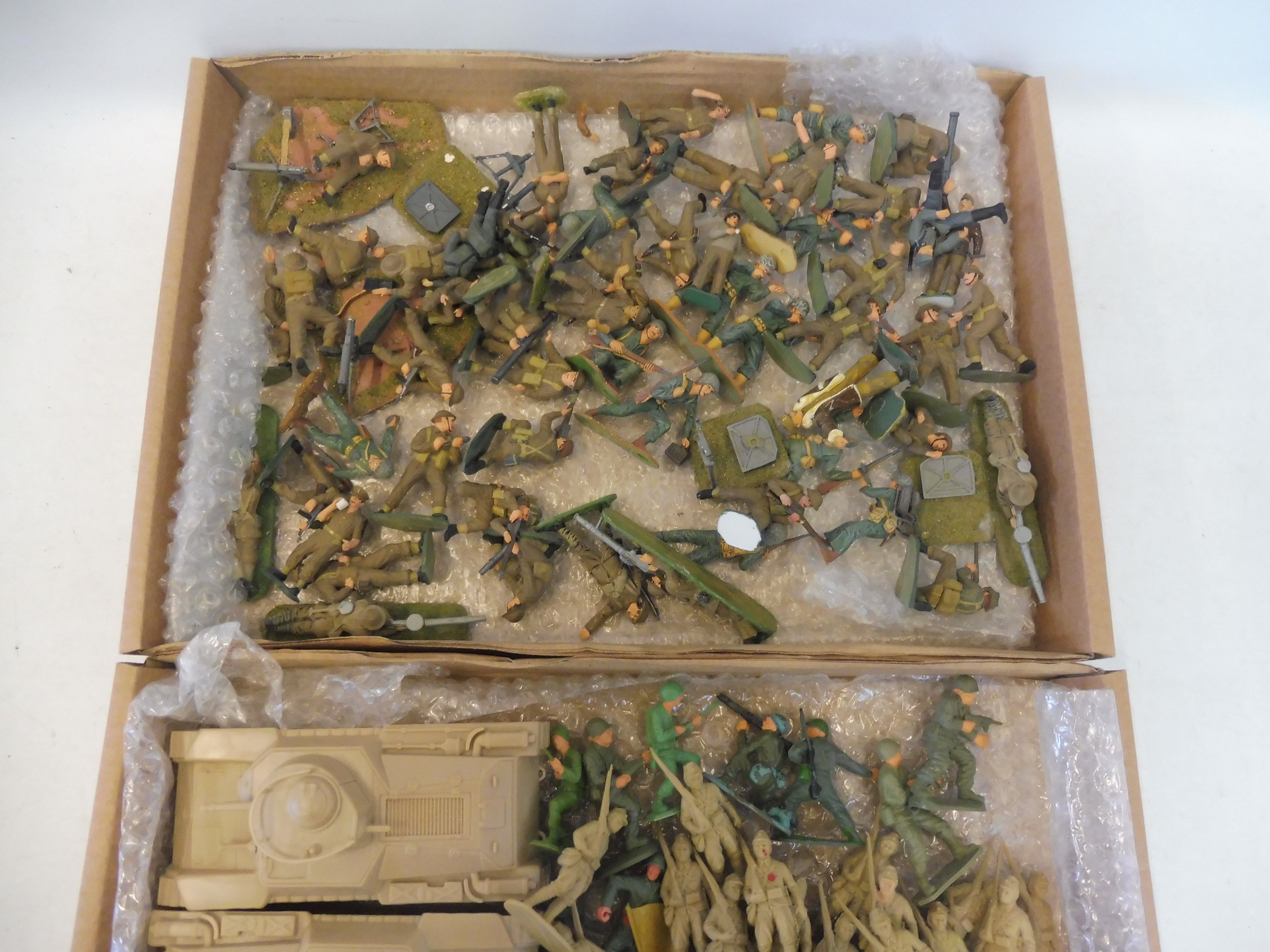 Two trays of WWII era Japanese soldiers.