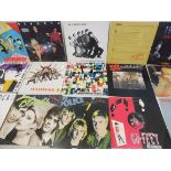 A collection of Punk, Post-Punk and Ska LPs - Madness, The Specials, The Beats, Squeeze, Adam and