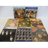 Eight Beatles LPs: Rubber Sole, Magical Mystery Tour, Beatles For Sale, Hard Day's Night and others.
