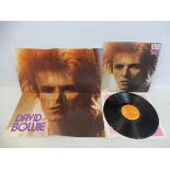 A re-issued Davie Bowie Space Oddysey on the Orange Victor label, song sheet inner and poster, in at