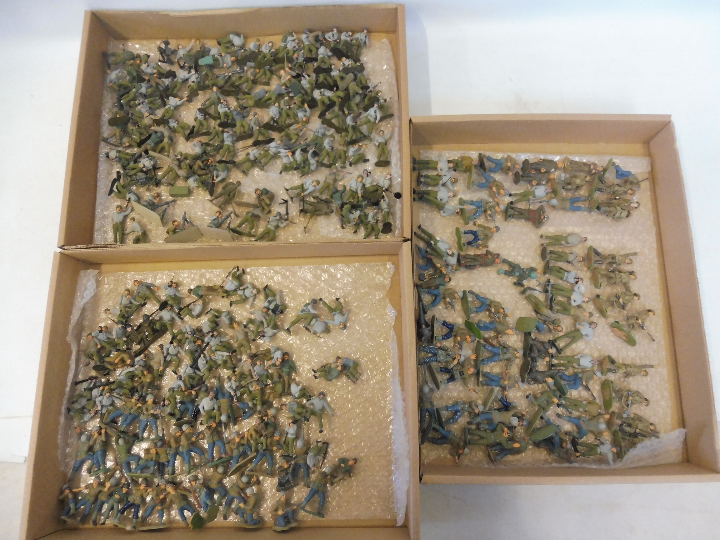 Three trays of well painted plastic WWII Russian soldiers.
