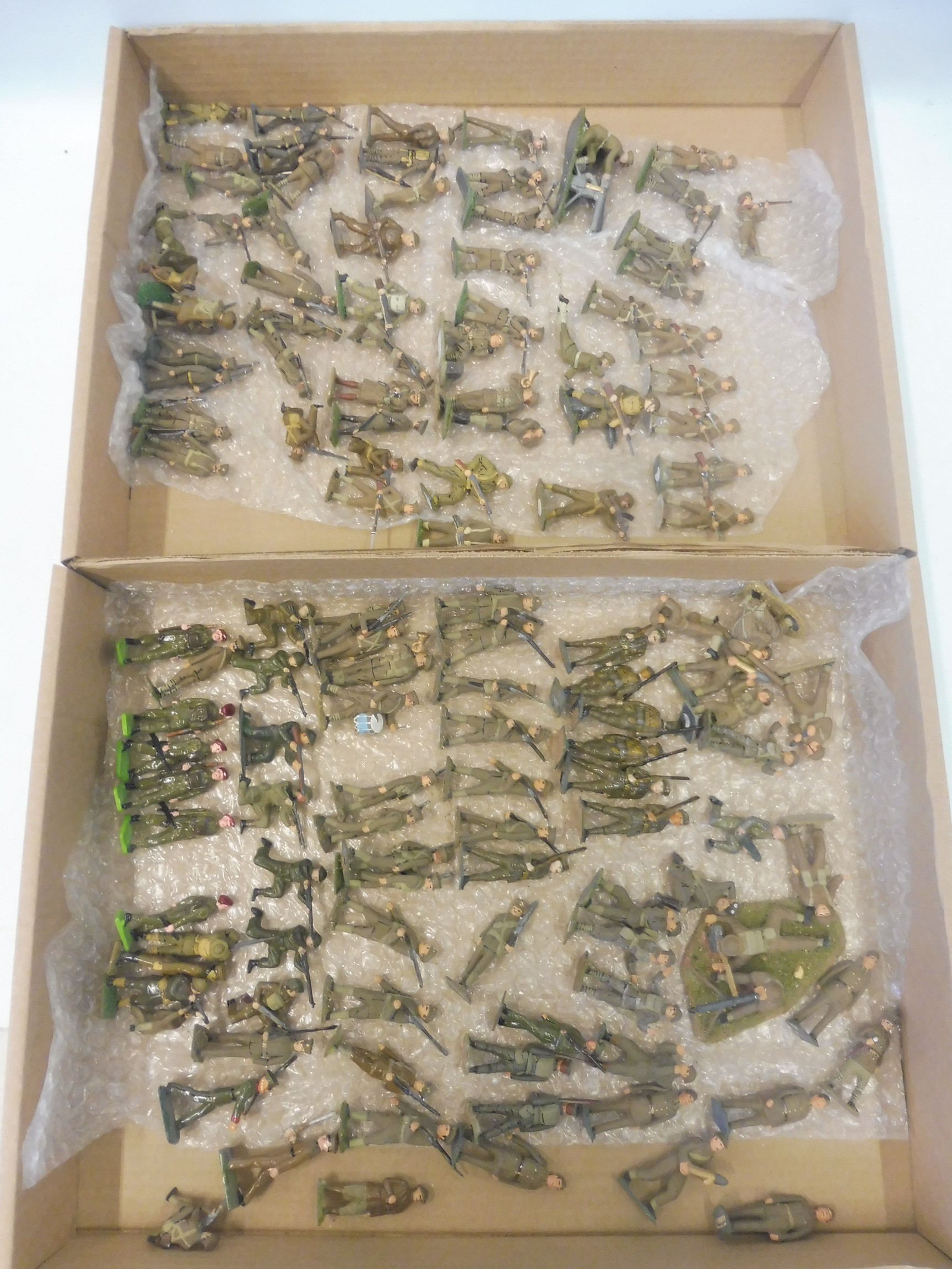 Two complete trays of well painted die-cast WWII British and American soldiers.