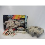 A Star Wars Milennium Falcon, Kenner maker in average box.