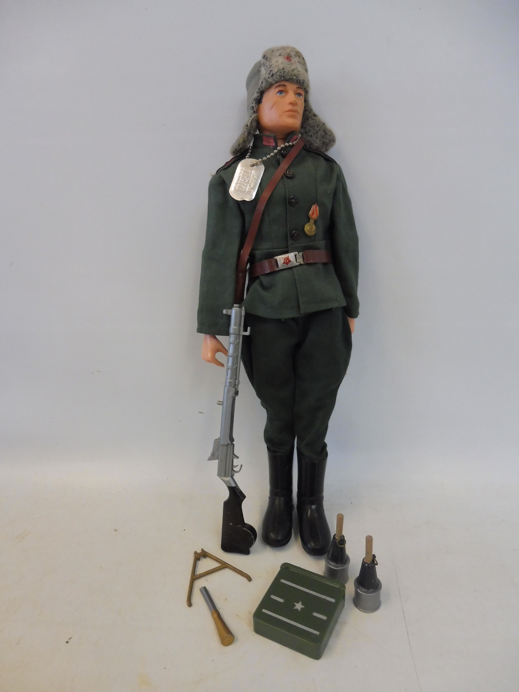 A complete Action Man Russian figure, in excellent condition, complete with dog tag, medal, grenades