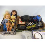 A quantity of dolls plus two Action man type figures, Monopoly, Tyco race set etc.