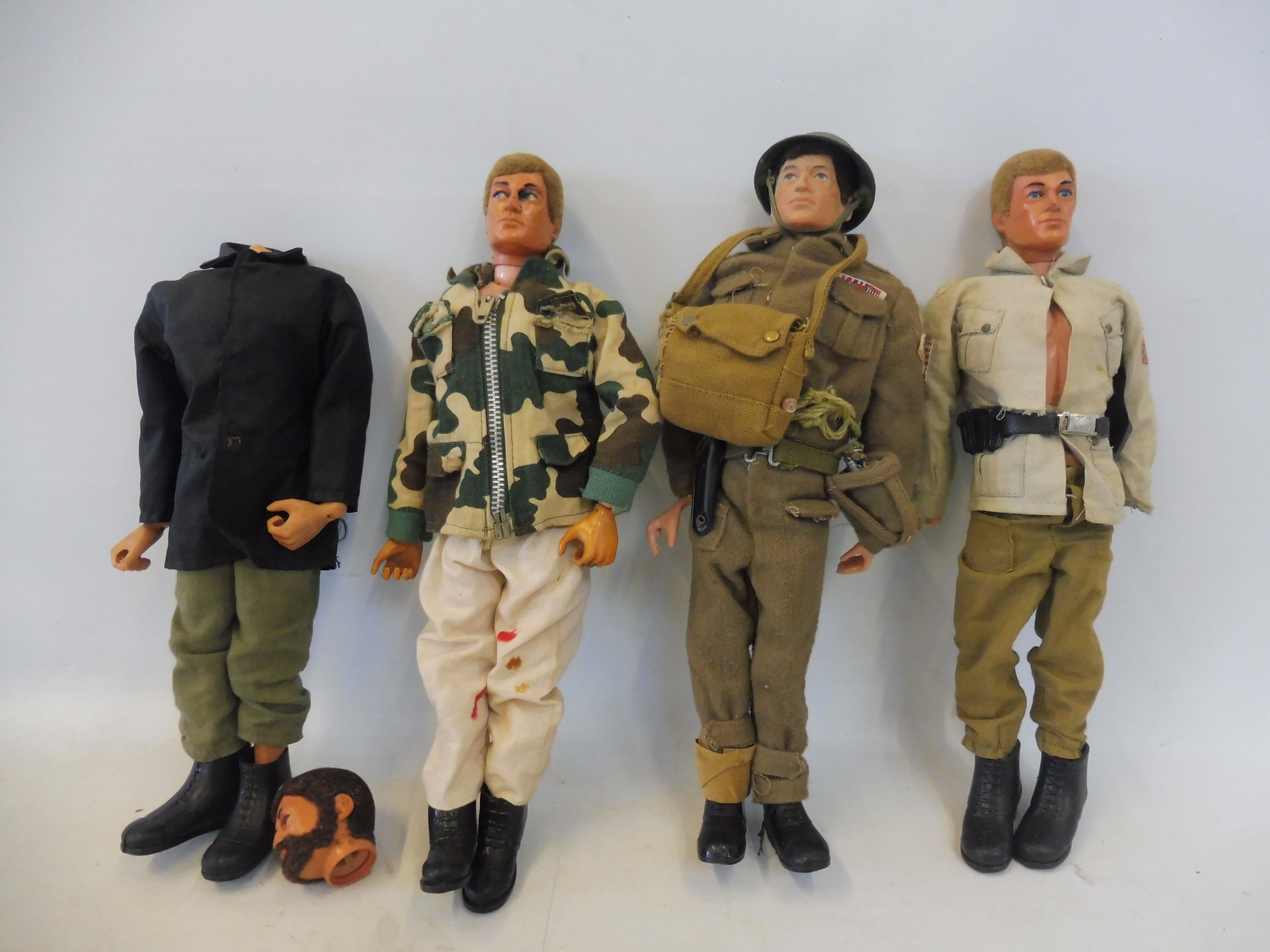 Four Action Man figures, circa 1970s, one in a complete British WWII uniform.