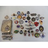 A quantity of assorted badges and small collectables.