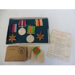 A WWII medal group awarded to Harry O. Colby including the Africa Star, plus box and explanation