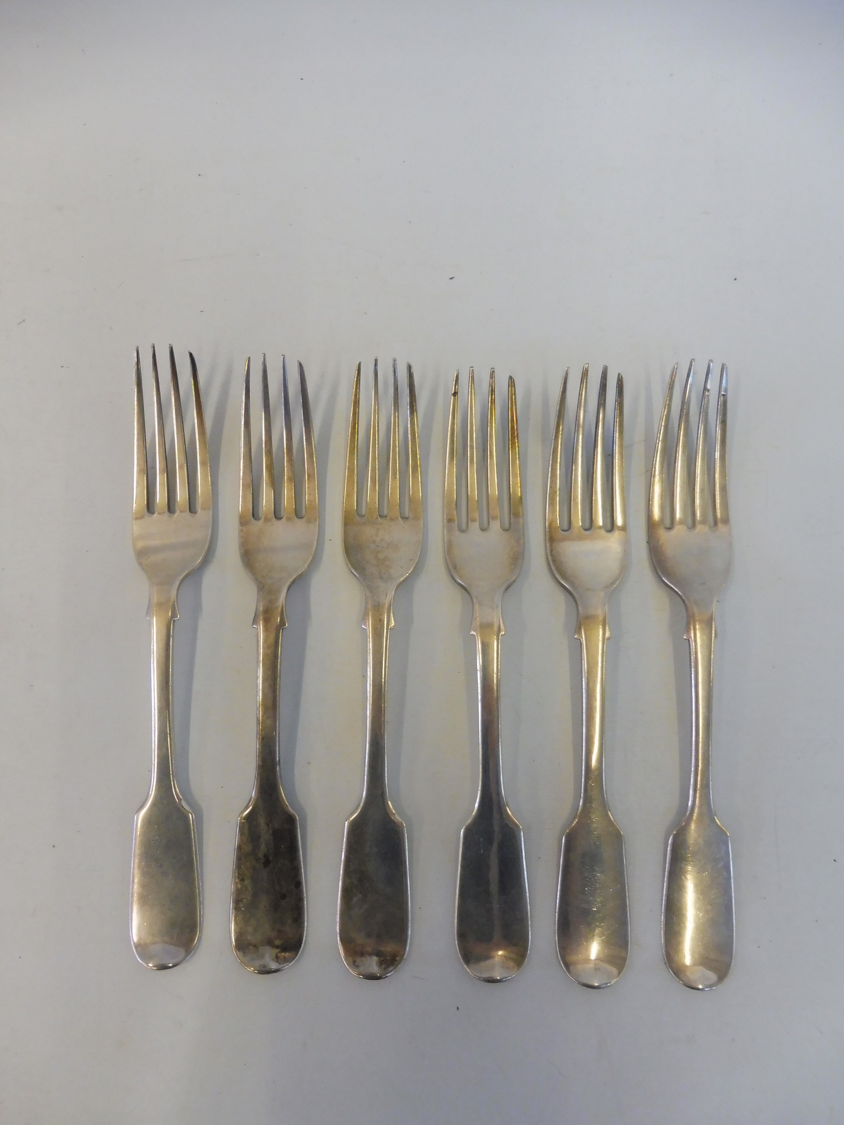 A set of six Victorian fiddle pattern dessert forks, London 1842, maker William Eley.