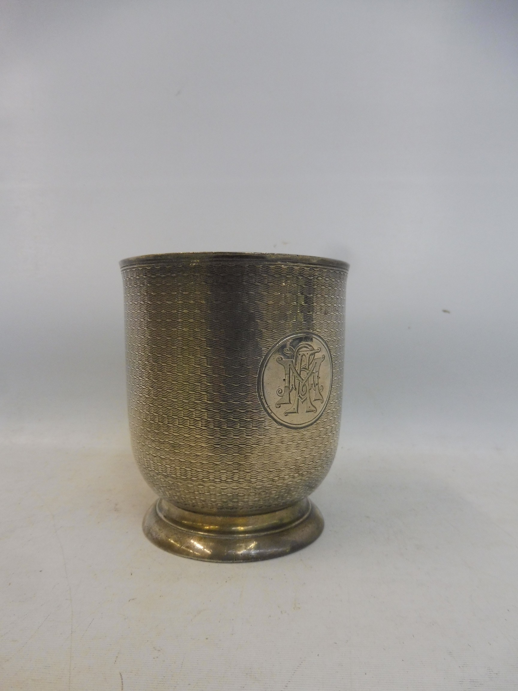 A Victorian silver christening mug with engine turned decoration and monogram, maker Charles