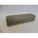 An Indian silver rectangular lidded box with allover repeating design, approx. 179.5g.