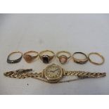 Six 9ct gold rings, approx. 16.5g overall and a 9ct gold lady's wristwatch approx. 12.7g.