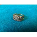 An unusual ring (presumed 9ct gold) set with 42 old brilliant cut diamonds, approx. 4.8g, size N/O.