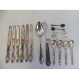 A selection of silver spoons etc.