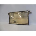 A silver plated rectangular wall mirror in the Art Deco style, with pierced side brackets and a