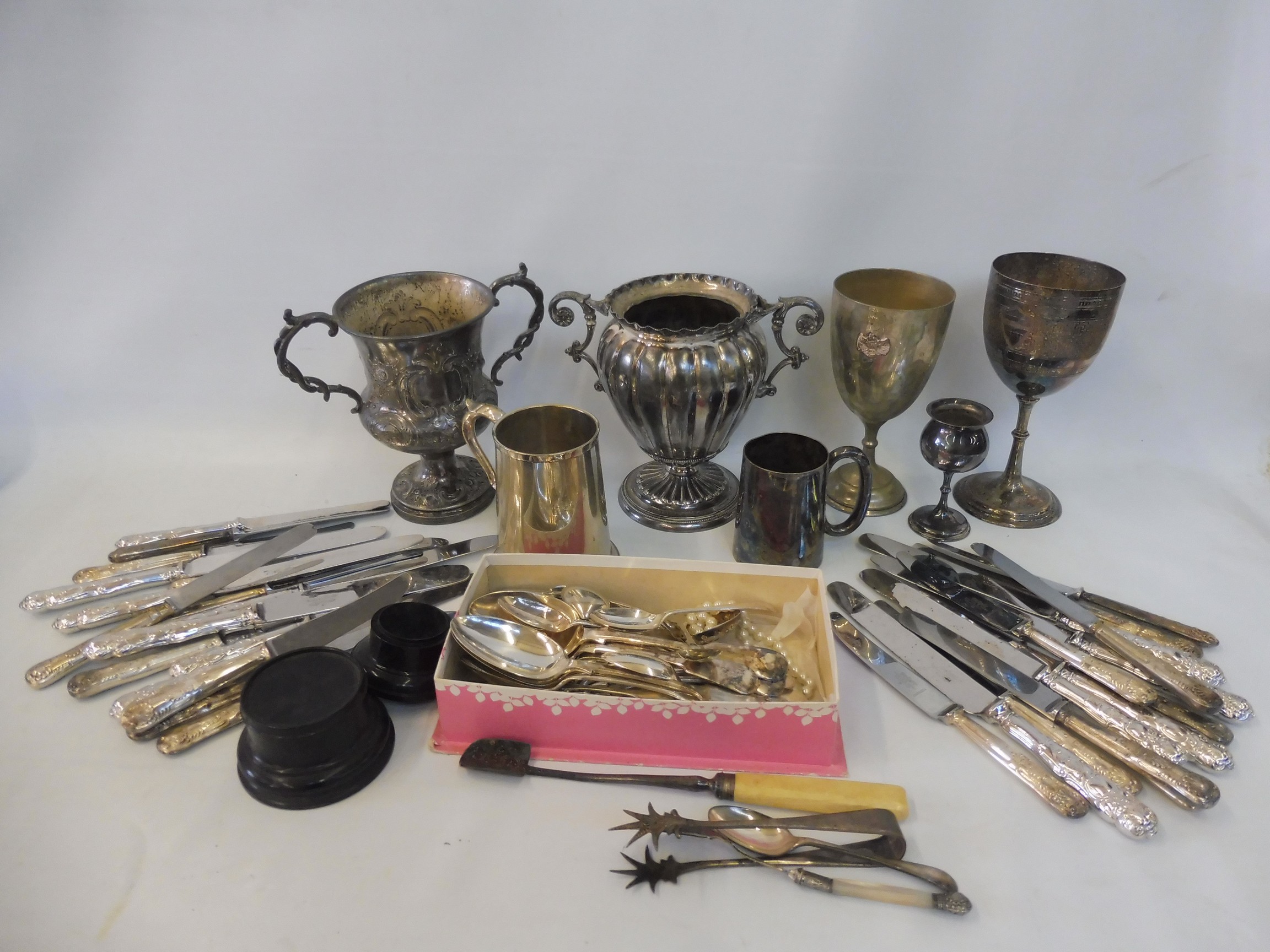 A collection of silver plated items including flatware.