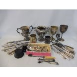 A collection of silver plated items including flatware.