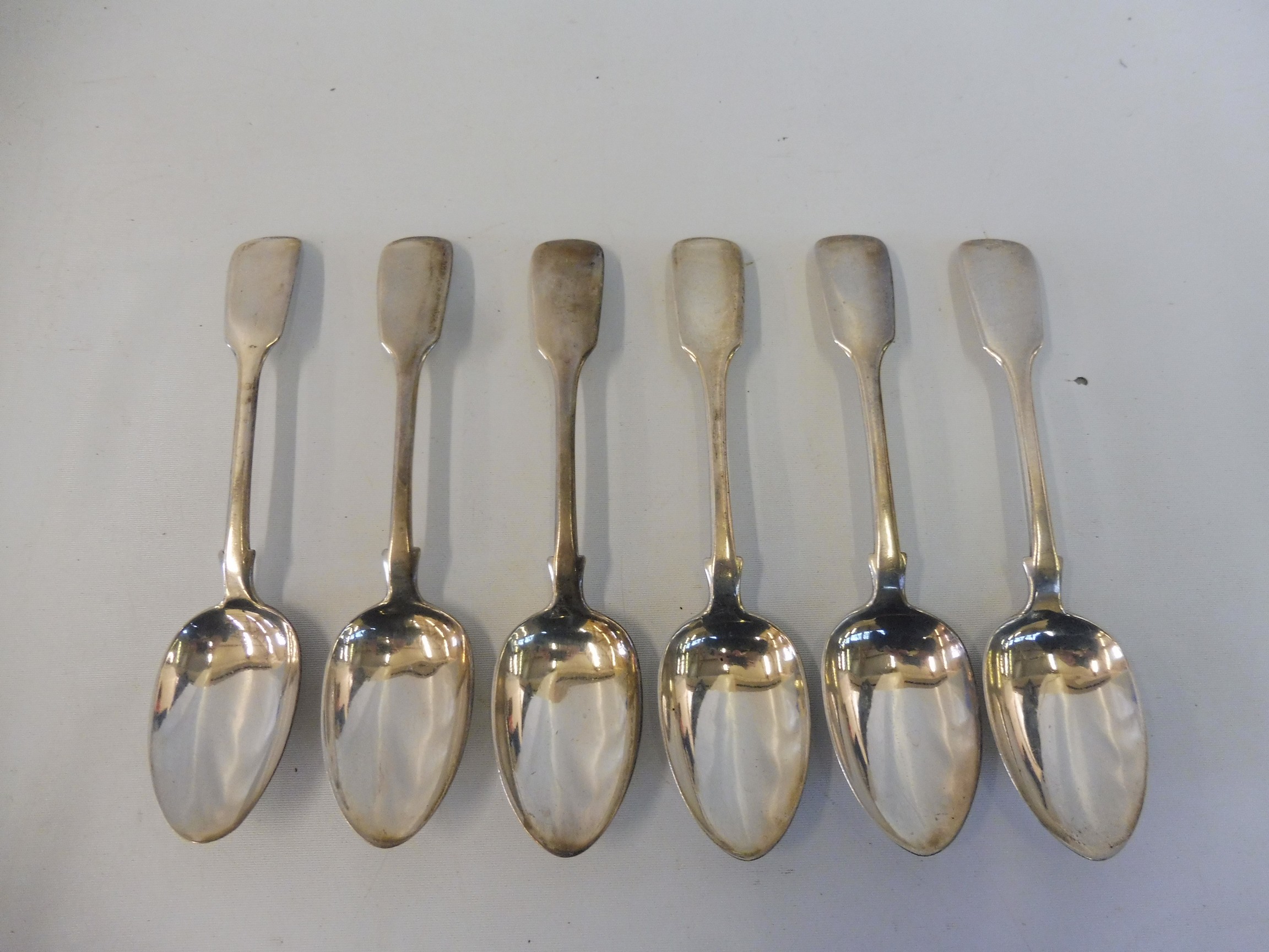 A set of six Victorian provincial fiddle pattern dessert spoons, Exeter 1845, maker W.R.Sobey.