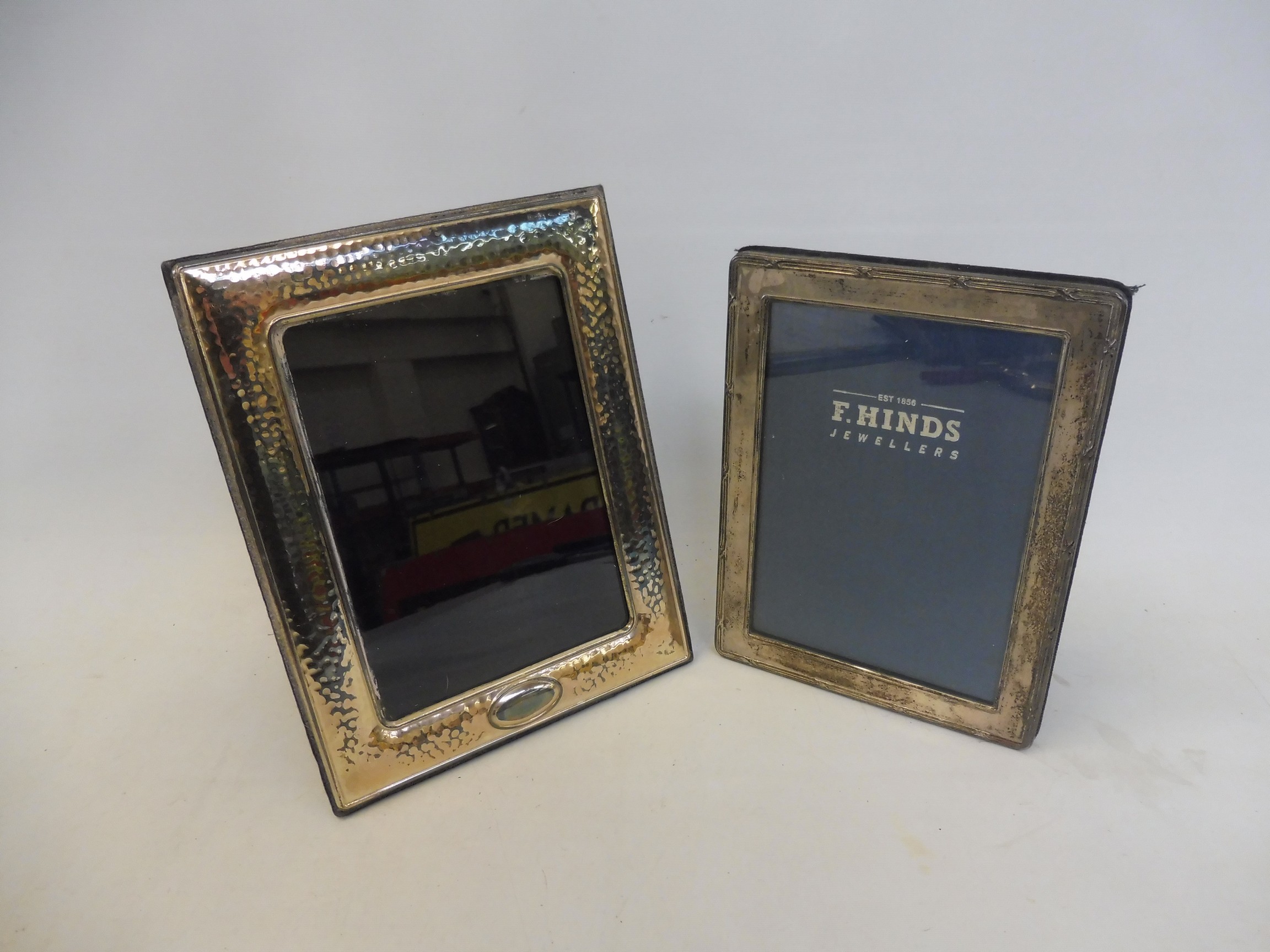 Two contemporary silver photograph frames.