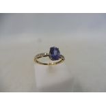 A tanzanite and diamond gold ring, size R to S, approx. weight 2.2g.