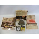 A cased Breitling stopwatch and various other collectables.