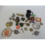 A quantity of assorted badges and small collectables.