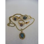 A selection of jewellery set with firestone opals.