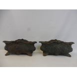 Two 20th Century Victorian style cast iron planters.