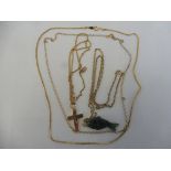 Two gold chains, approx 5.3g overall, a gold chain with a yellow metal cross attached, approx. 4g,