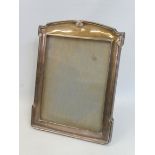 A stylish silver easel photograph frame with scrolled and grooved edge, maker W.N. Ltd. Birmingham