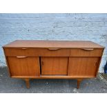 A G-Plan style sideboard, 54" w x 30 1/2" h x 18" d.