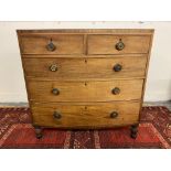 A 19th Century mahogany bow fronted chest of two short over three long drawers to turned supports,