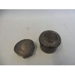 A silver pill pot, London 1909 and one other Birmingham, 1910, approx. 54.9g overall.