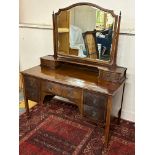 An Edwardian mahogany and chequer strung dressing table, 48" wide, plus a mahogany bedside