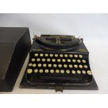 A cased Remington Home Portable typewriter.