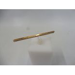 A 9ct gold tie pin, approx. 2.6g.