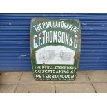 An early pictorial enamel sign advertising 'C.F.Thomson & Co. The Popular Drapers, Peterborough', 27