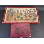 A boxed set of ABC Picture Blocks, plus a Raphael Tuck's Zag-Zaw picture puzzle.