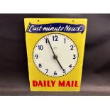 A Sectric Mains glass fronted wall clock bearing advertising for Daily Mail 'Last-minute News', 11 x
